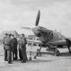 12 - Spitfire Mk. IXC 313. čs. stíhací perutě RAF na polním letišti Appledram v dubnu 1944 během příprav na vylodění v Normandii. 